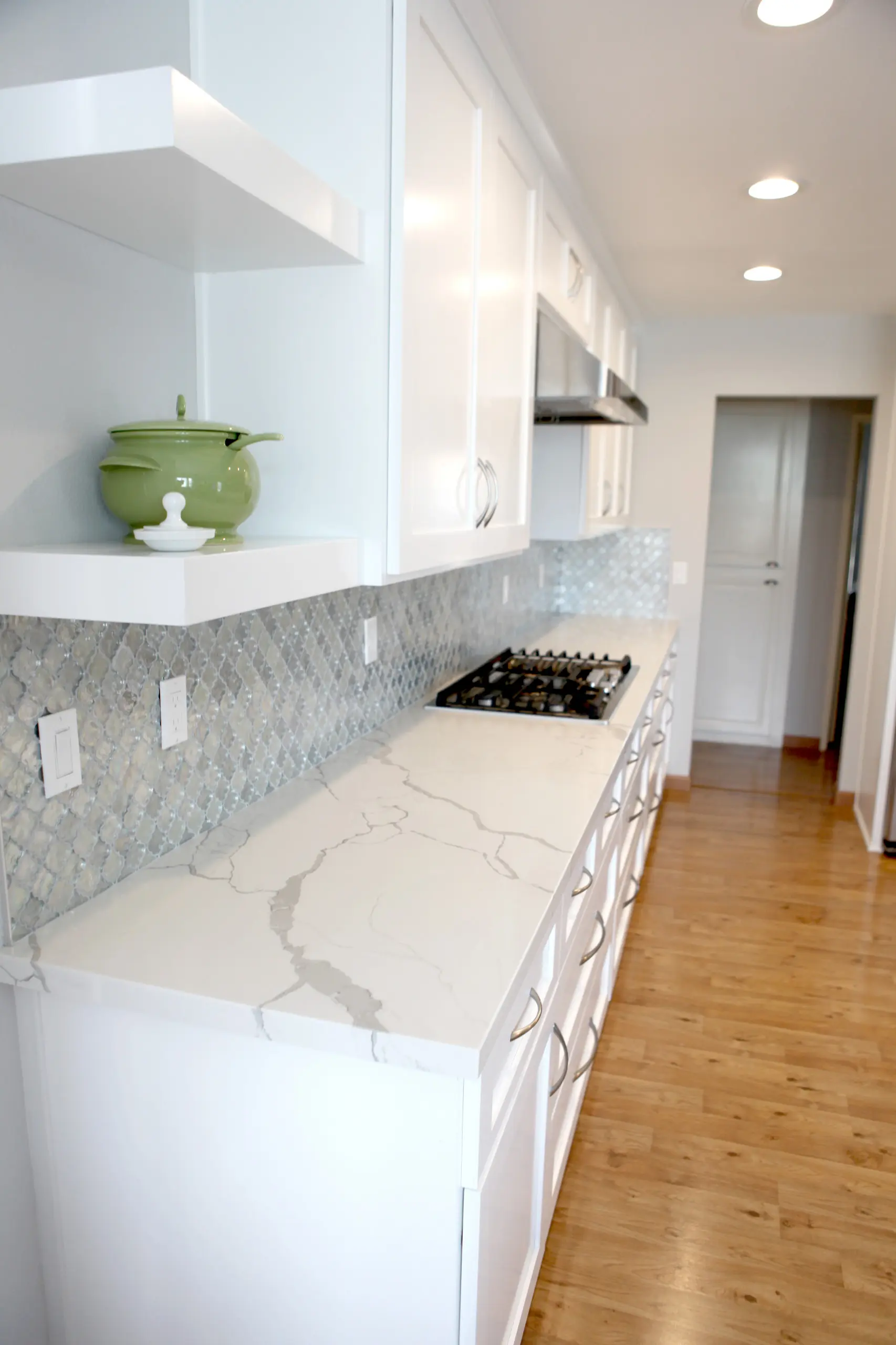 Kitchen remodel with marble-look quartz and mosaic backsplash in Brea