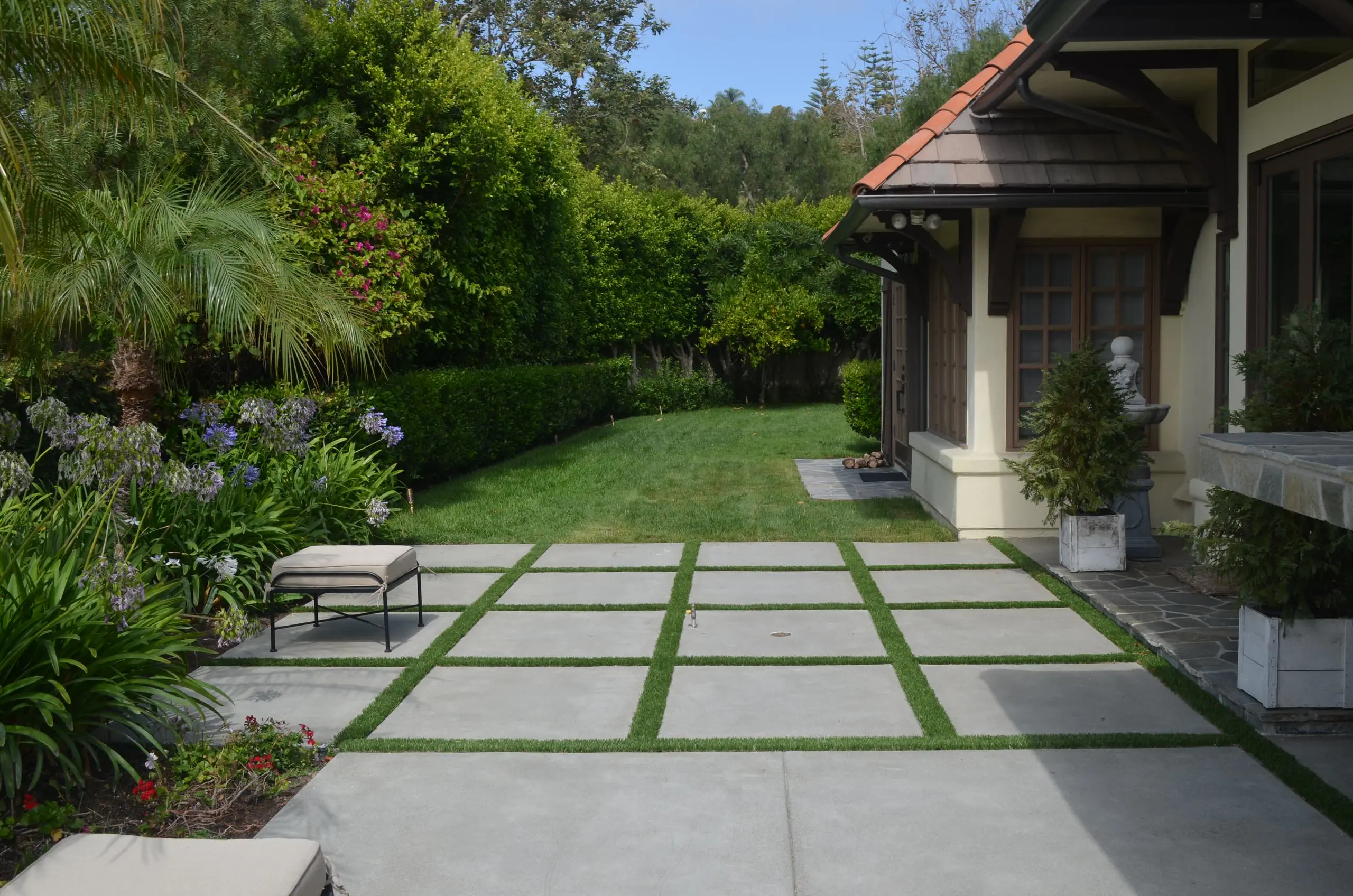 Concrete paver patio with turf joints and landscaping in Yorba Linda